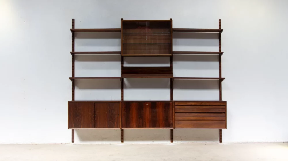 Bibliothèque Cado Poul Cadovius vintage en palissandre de Rio avec porte revue rare